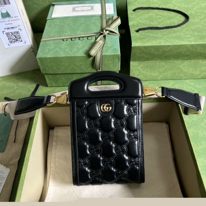 G*u*i top handle bags